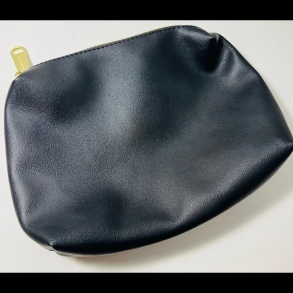 Steve Madden solid black makeup pouch or clutch
